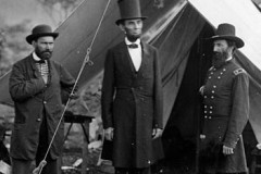 “Realistic suited man. […] The American president visits the battlefield in a suit that turns him into a tower, a column, a reassuring and noble monument under the framing tend.” –Anne Hollander, Sex and Suits (Image via Wikimedia)